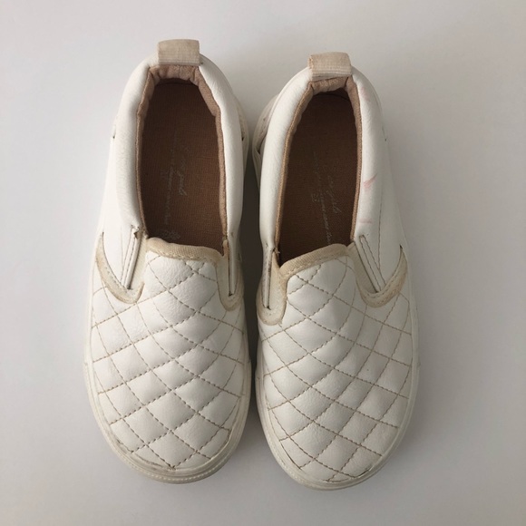 white quilted slip on sneakers